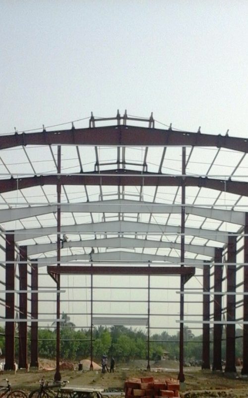 Modern pre-engineered building in India used for a retail showroom complex.