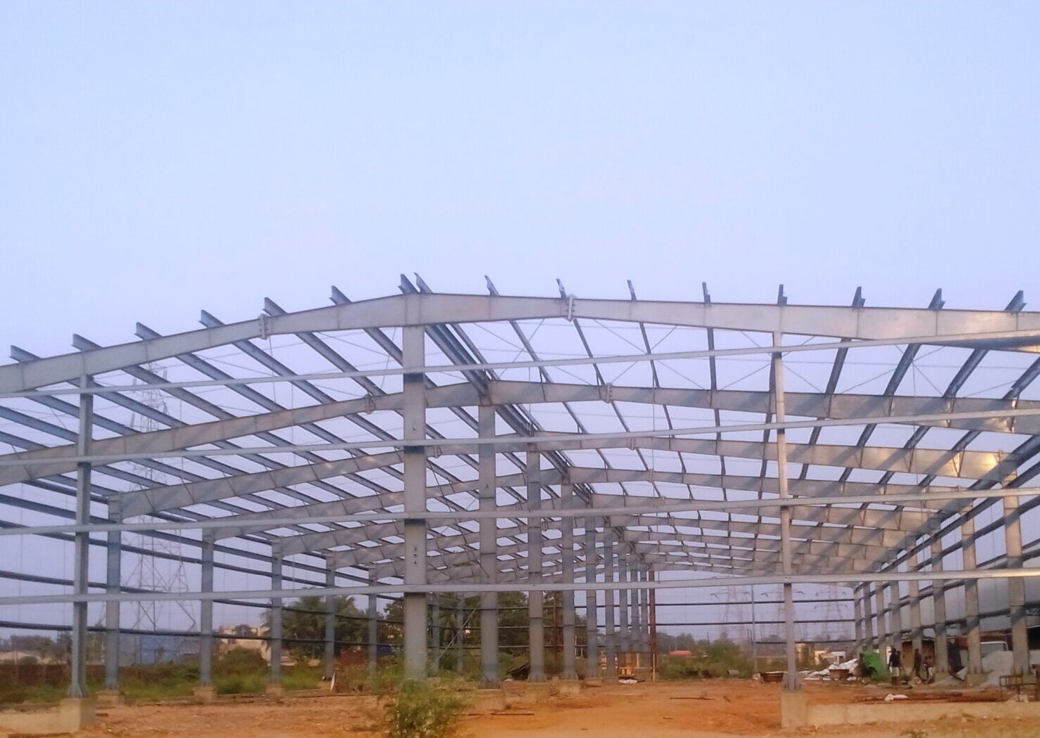 High-durability PEB structure manufacturer in India showing a completed industrial warehouse.